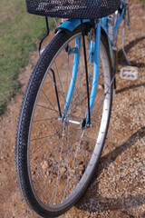 Fototapeta na wymiar Close-up of bicycle front wheel