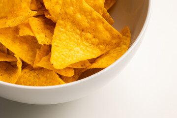 Crispy mexican nachos chips salty.Snacks Fast food or junk food snacks unhealthy concept.