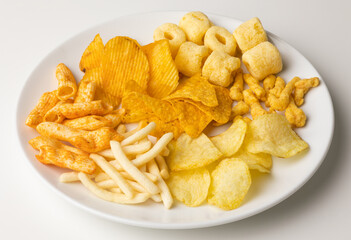 Many Crispy Snacks food potato chip salty. Fast food or junk food snacks unhealthy concept.