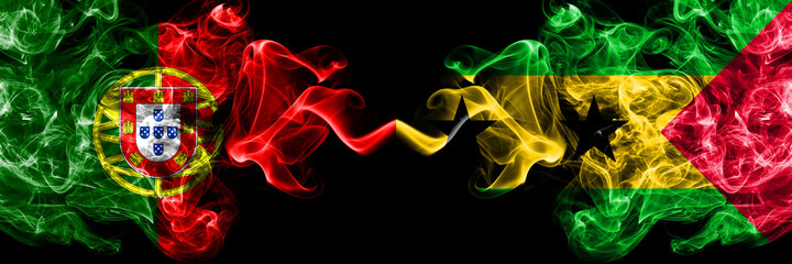 Portugal, Portuguese vs Sao Tome and Principe smoky mystic flags placed side by side. Thick colored silky abstract smoke flags.