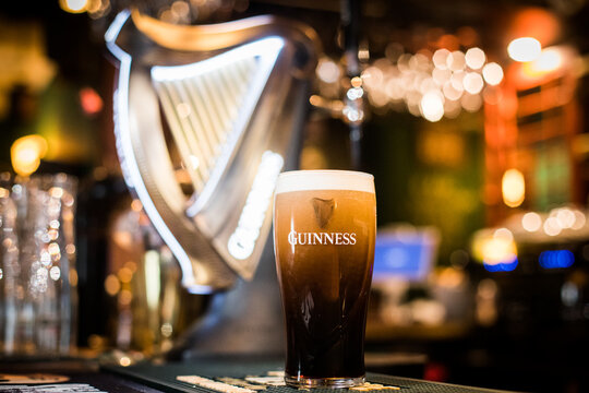 Pint of Guinness beer on a pub's counter