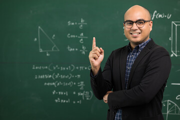 Young asian teacher man teaching video conference with student. Male Indian teacher training the mathematics in classroom from online course.