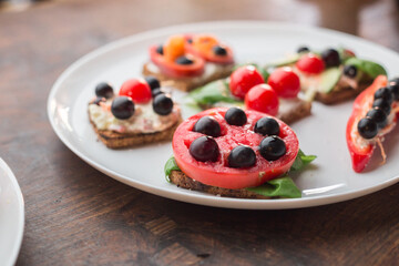 Tasty looking vegetarian sandwiches on a white plate