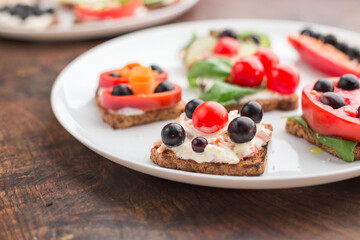 Freesh vegetarian sandwiches on a white plate