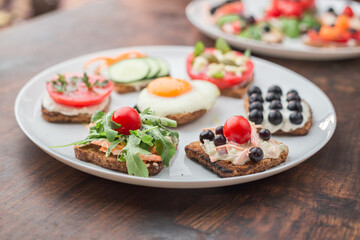 Tasty looking vegetarian sandwiches on a white plate