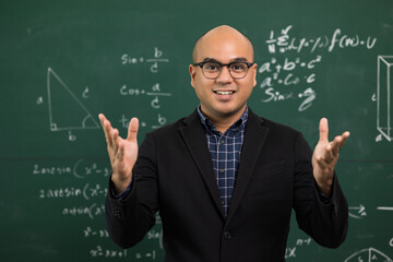 Young asian teacher man teaching video conference with student. Male Indian teacher training the mathematics in classroom from online course.