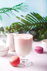 Glass of strawberry iced Dalgona whipped drink coffee