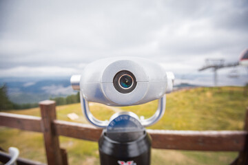 Coin operated telescope for sightseeing