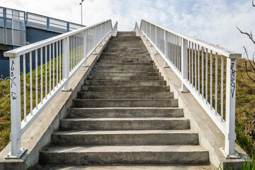 Novi Sad, Serbia - March 05. 2021: Stairs leading to the Varadin Bridge, which connects two banks on the Danube River near Novi Sad, Serbia. 