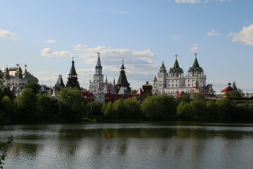 view of the Izmailovsky kremlin across the lake moscow Russia summer
