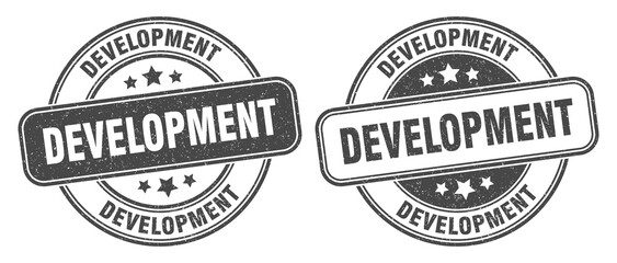 development stamp. development label. round grunge sign