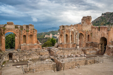 Fototapeta na wymiar Amphitheatre of Taormina in Siciliy at cloudy day, Italy.