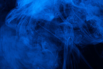 Blue steam on a black background.