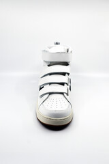 white basketball shoes with convenient velcro