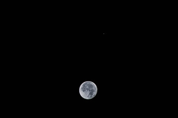 Dark sky with the conjunction of Moon and Mars