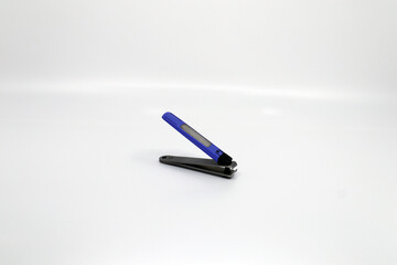 a long-used purple nail clipper