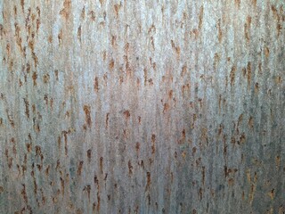 Colored rusty stained metal wall texture pattern