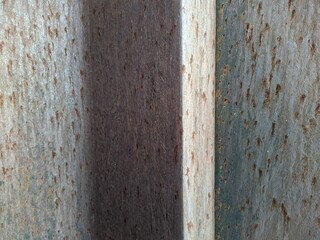 Colored rusty stained metal wall texture pattern