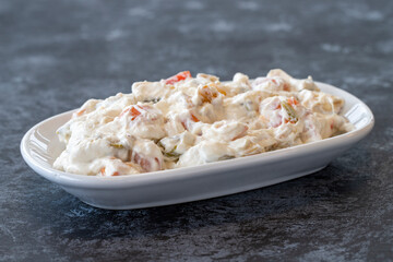 Panco appetizer prepared with potatoes, yogurt and peppers. Traditional Turkish and Arabic cuisine meze. Snack meal served alongside the main course. Natural vegetarian food. Local name Panco mezze