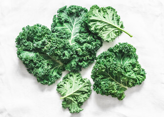 Fresh kale on a light background, top view. Health diet food