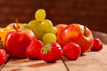 fresh and tasty strawberries, apples, berries