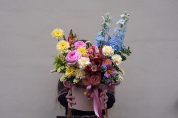 Girl with a bouquet of flowers