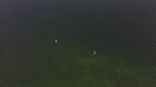 Two kayaks in the sea. Drone footage from above