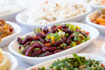 Mexican salad. Healthy food. Snack meal served alongside the main course. Bulk appetizer plates. Natural vegetarian food.