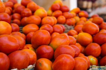 Baskets of Fresh organic tomatoes in the market