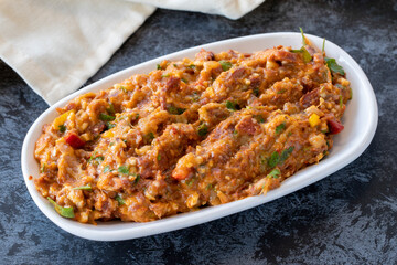Spicy appetizer. Traditional Turkish and Arabic cuisine meze. Snack meal served alongside the main course. Natural vegetarian food. Local name yandım hacer