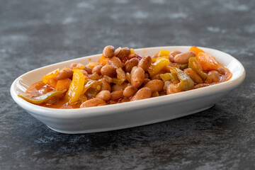 Kidney bean appetizer. Traditional Turkish and Arabic cuisine meze. Snack meal served alongside the main course. Natural vegetarian food. Barbunya plaki. Chili beans