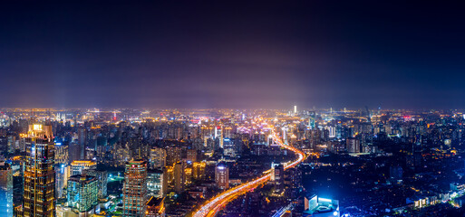 Fototapeta na wymiar Shanghai skyline and buildings with highway at night.