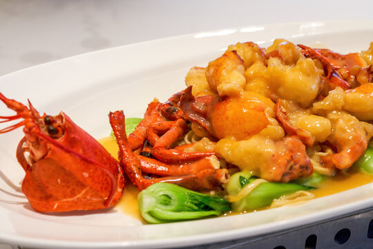 A delicious Chinese Cantonese dish, baked lobster cubes with cheese