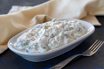 healthy vegetarian food, purslane salad with yoghurt. Traditional Middle Eastern Appetizer