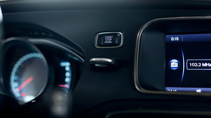 Start stop engine modern new car button.
