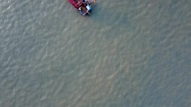 Fishing boats anchored off Ladghar beach at Dapoli, located 200 kms from Pune on the West Coast of Maharashtra India.
