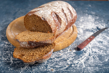 Homemade baked bread on wooden board