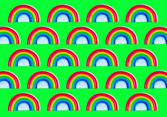 Rainbow pattern on green background. Gay pride concept