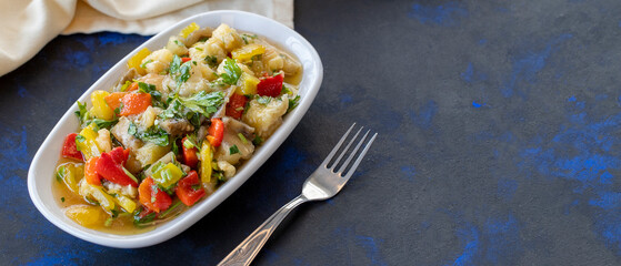 Anamur salad appetizer prepared with many vegetables. Traditional Middle Eastern appetizers with the main course. Layout on dark wood. copy space