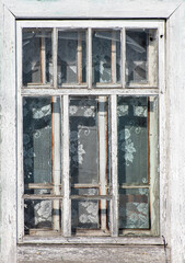 Old wooden window. Vintage frame texture with peeling paint.