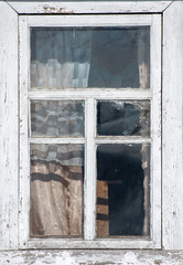 Old wooden window. Vintage frame texture with peeling paint.