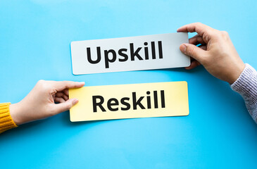 Up skill and re skill text on bubble paper.performance or development of person concepts