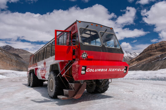 A snowcoach shuttles visitors to the Icefields glacier near Jasper, Canada on June 10, 2014