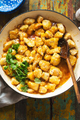 Sweet and sour coconut chicken pieces 

