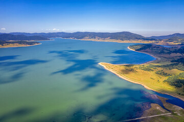 Fototapeta premium Scenic aerial view with a drone of an amazing Batak dam, Bulgaria with crystal water