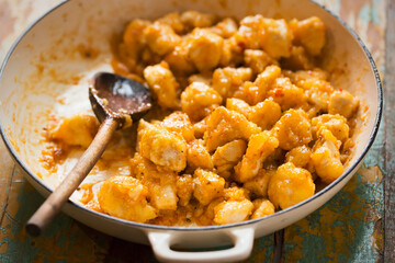 Sweet and sour coconut chicken pieces 
