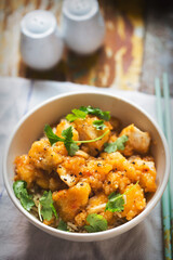 Sweet and sour coconut chicken pieces 
