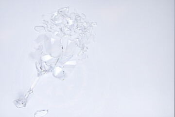 Broken glass on a white background with space for printing.
