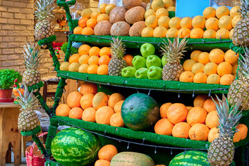 The street counter is a display case with beautifully neatly arranged fruits. Turkish style fruit layout