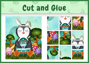 Children board game cut and glue themed easter with a cute penguin using bunny ears headbands hugging eggs